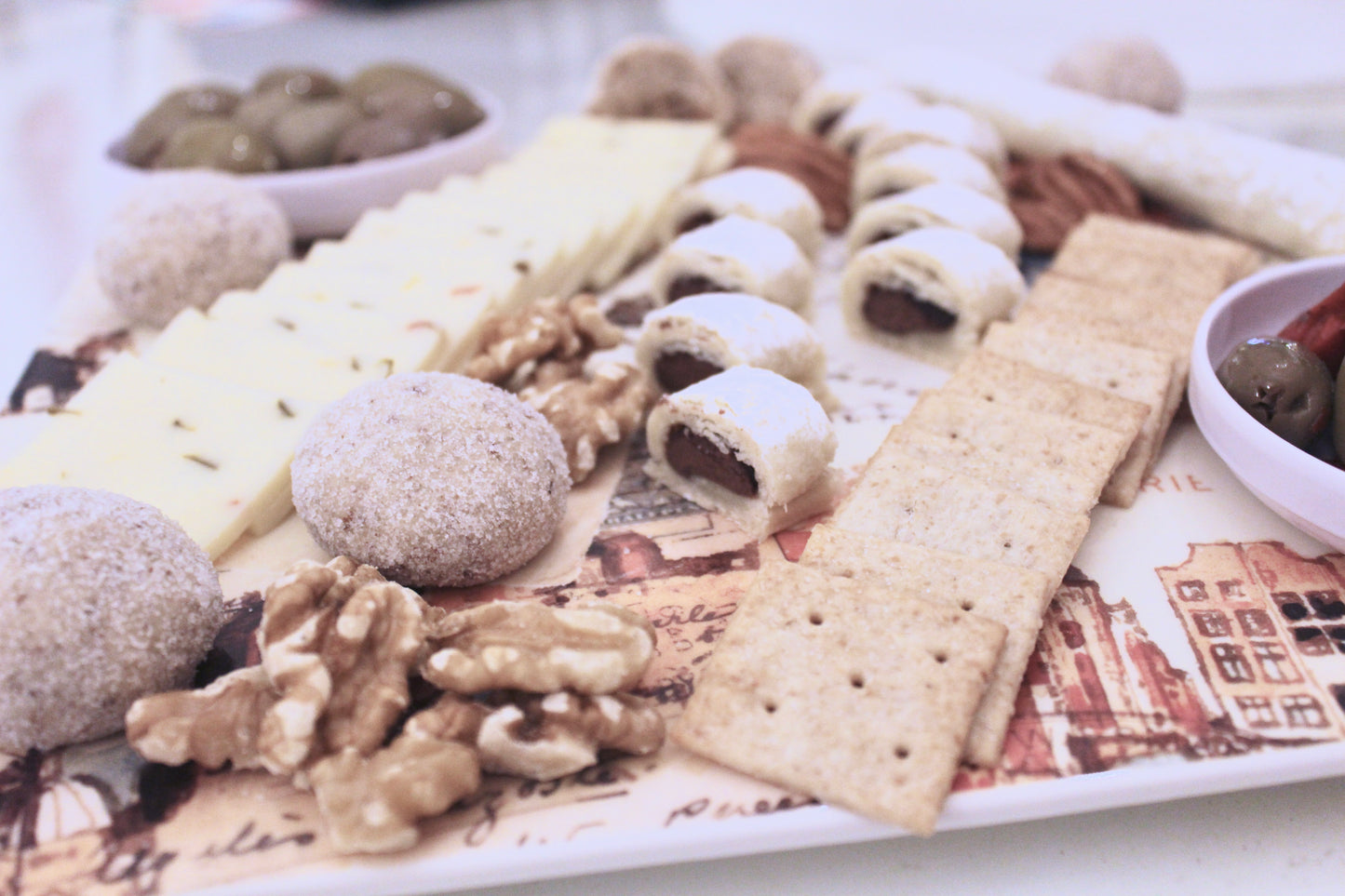 Charcuterie Board with Chocolate Baguettes and Pecan Pom Pom Tea Cakes